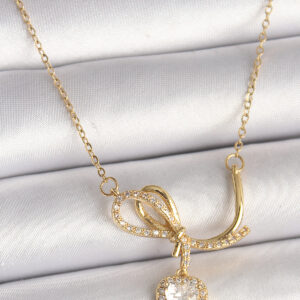 Tegan 316L Çelik Gold Renk Zincir Zirkon Taşlı Düğüm Sallantı Kalp Model Kadın Kolye TG27BKO9857