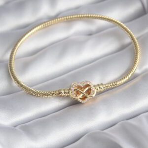 Tegan Pirinç Gold Renk Zirkon Taşlı Kalp Sonsuzluk Model Charm Kadın Bileklik TG27BB5797