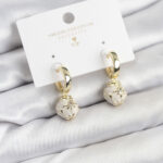 Tegan Pirinç Gold Renk Topçuk Model Mineli Halka Kadın Küpe TG27BKP11636