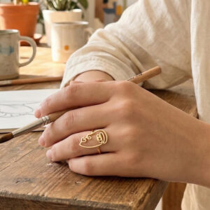 Tegan Pirinç Gold Renk Picasso Tarzı Tek Çizgi Yüz Model Kadın Yüzük TG27BYK4158